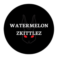Lähikuva Watermelon Zkittlez-kukinnosta, jossa näkyy kauniita vihreän ja violetin sävyjä, runsaasti trikomeja - Kaninkolo
