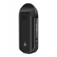 Musta Flowermate Cap Pro -kuivayrttivaporisaattori, tyylikäs ja kompakti muotoilu, moderni höyrystin